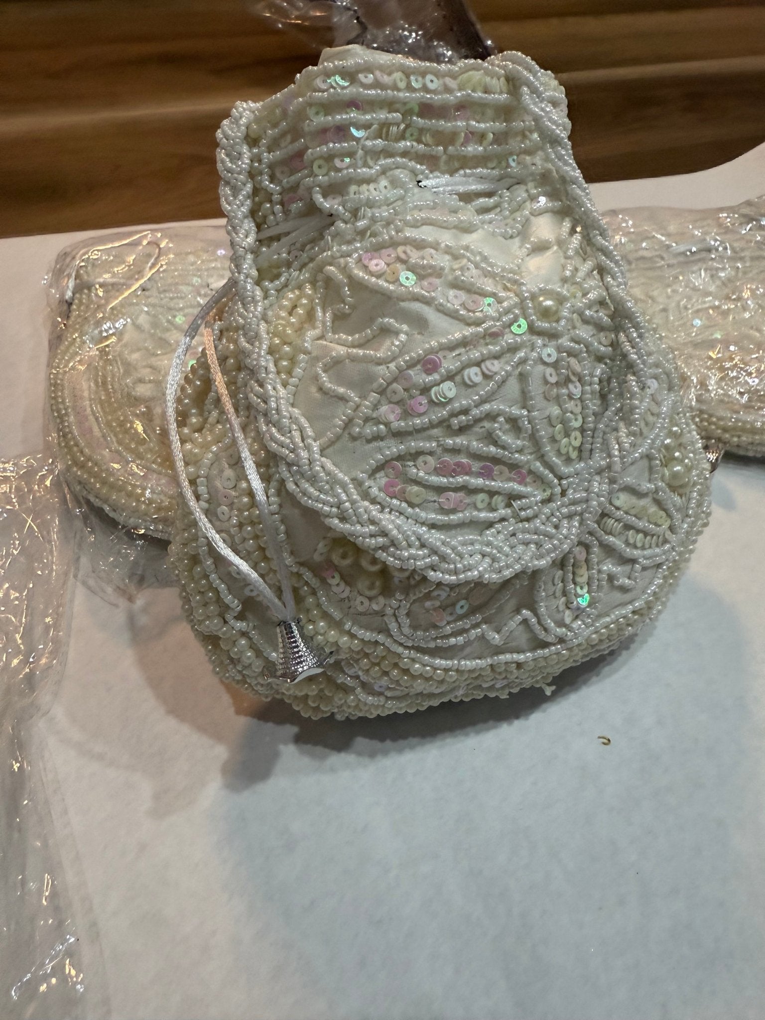 White heavy embroidery Potli Wedding Gift for Women - DWEEP SARA